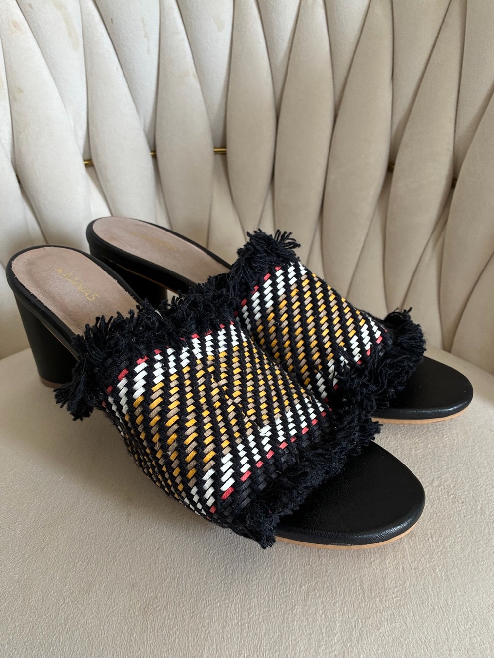 Kaanas Black Woven Fringe Mules with Yellow, White & Red Accents